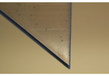 Precision polymer cutting with femtosecond UV laser